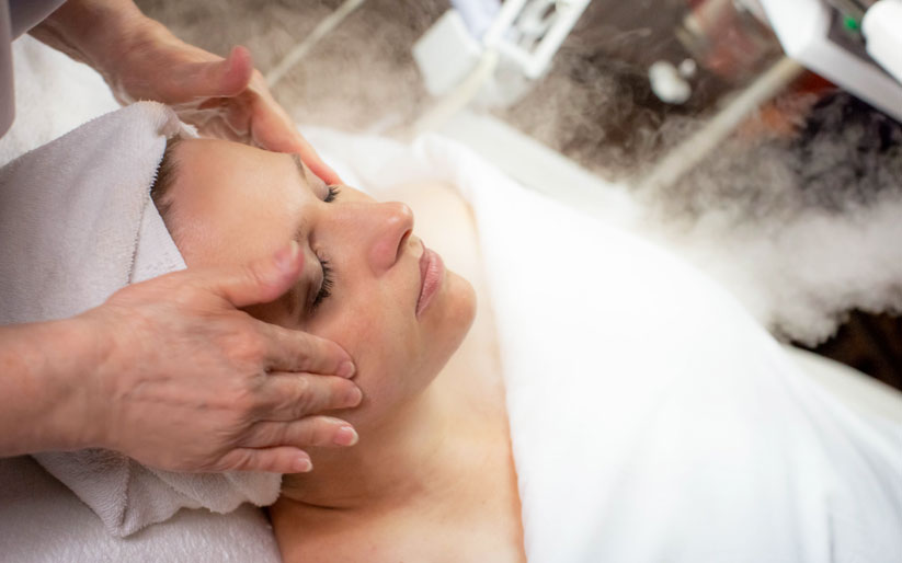 Woman Cleansing Facial