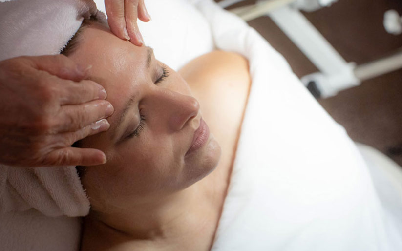 Woman Getting Facial Massage