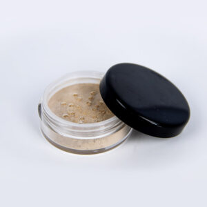 open cylindrical container of loose mineral face powder with black lid